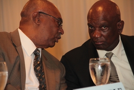 Assistant Commissioner of Police in the Royal St. Christopher and Nevis Police Force responsible for the Nevis Division Mr. Robert Liburd (r) with Premier of Nevis Hon. Joseph Parry during the 9th annual Police Constables Award Ceremony and Dinner at the Occasions Entertainment Arcade in Pinneys